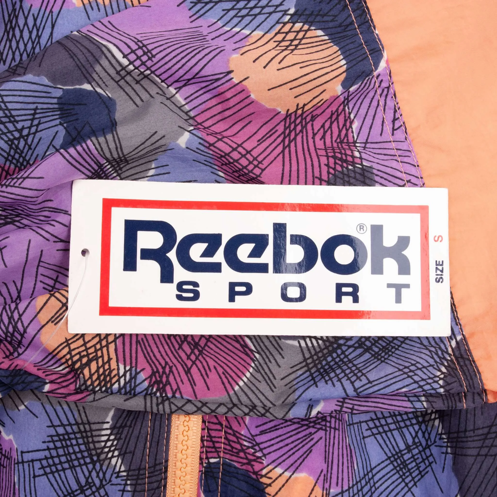 VINTAGE REEBOK PURPLE WINDBREAKER JACKET 1990S SIZE SMALL DEADSTOCK NOS